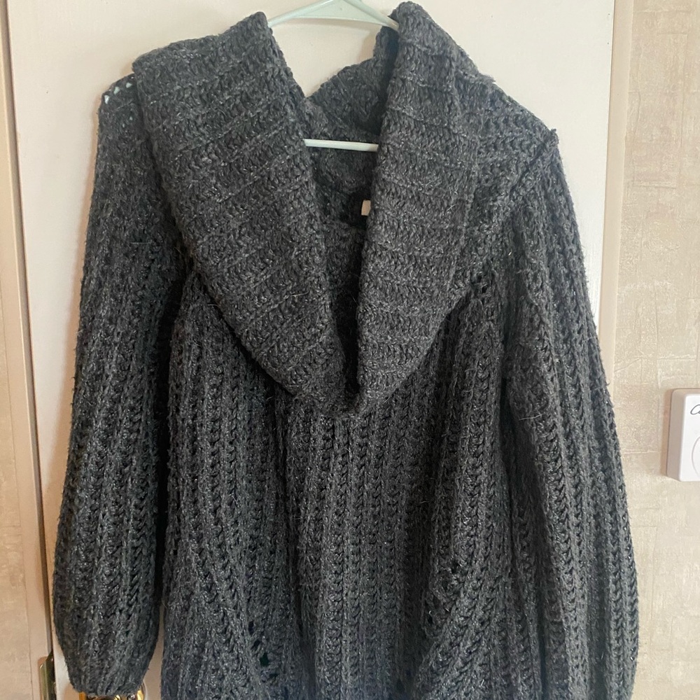 Sweater with scarf-like neckline